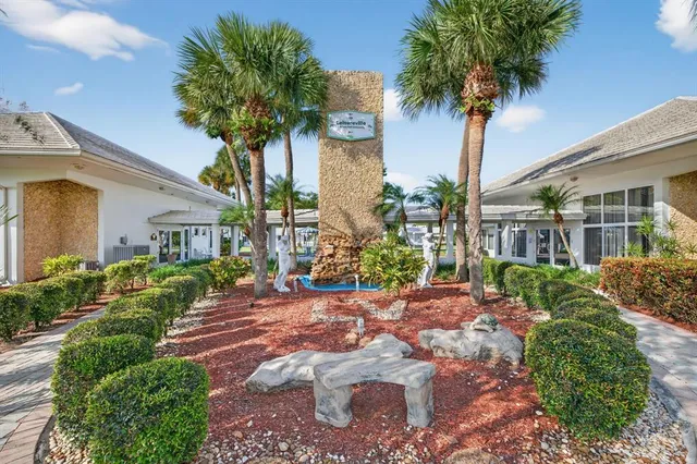a view of a swimming pool with a lounge chairs