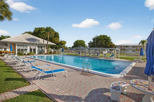 a view of a house with backyard porch and patio