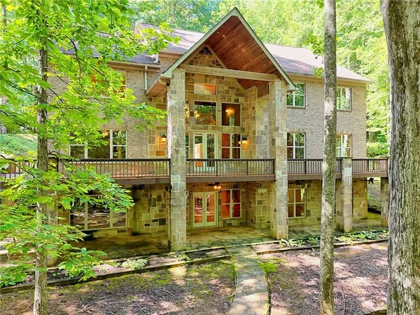 a view of a park with a tree