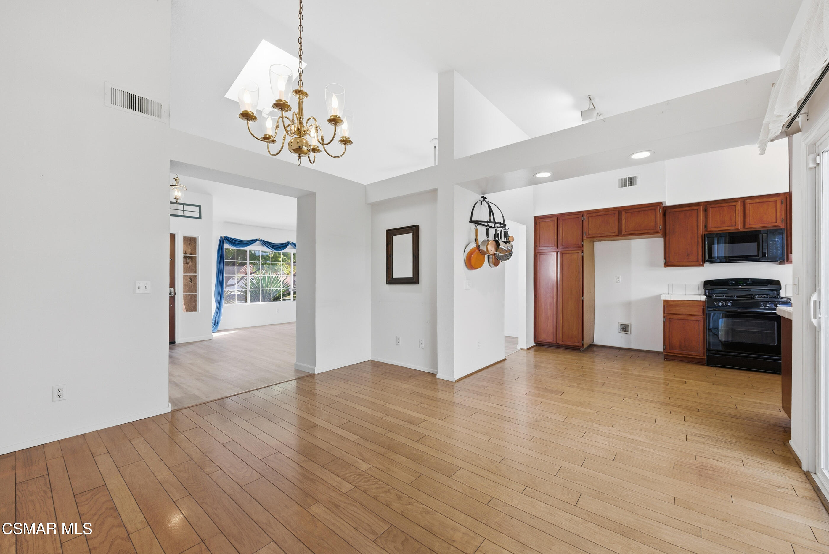 2565 Winthrop Court Simi Valley, CA 93065 - Photo 11 of 37 a view of an empty room with kitchen and window