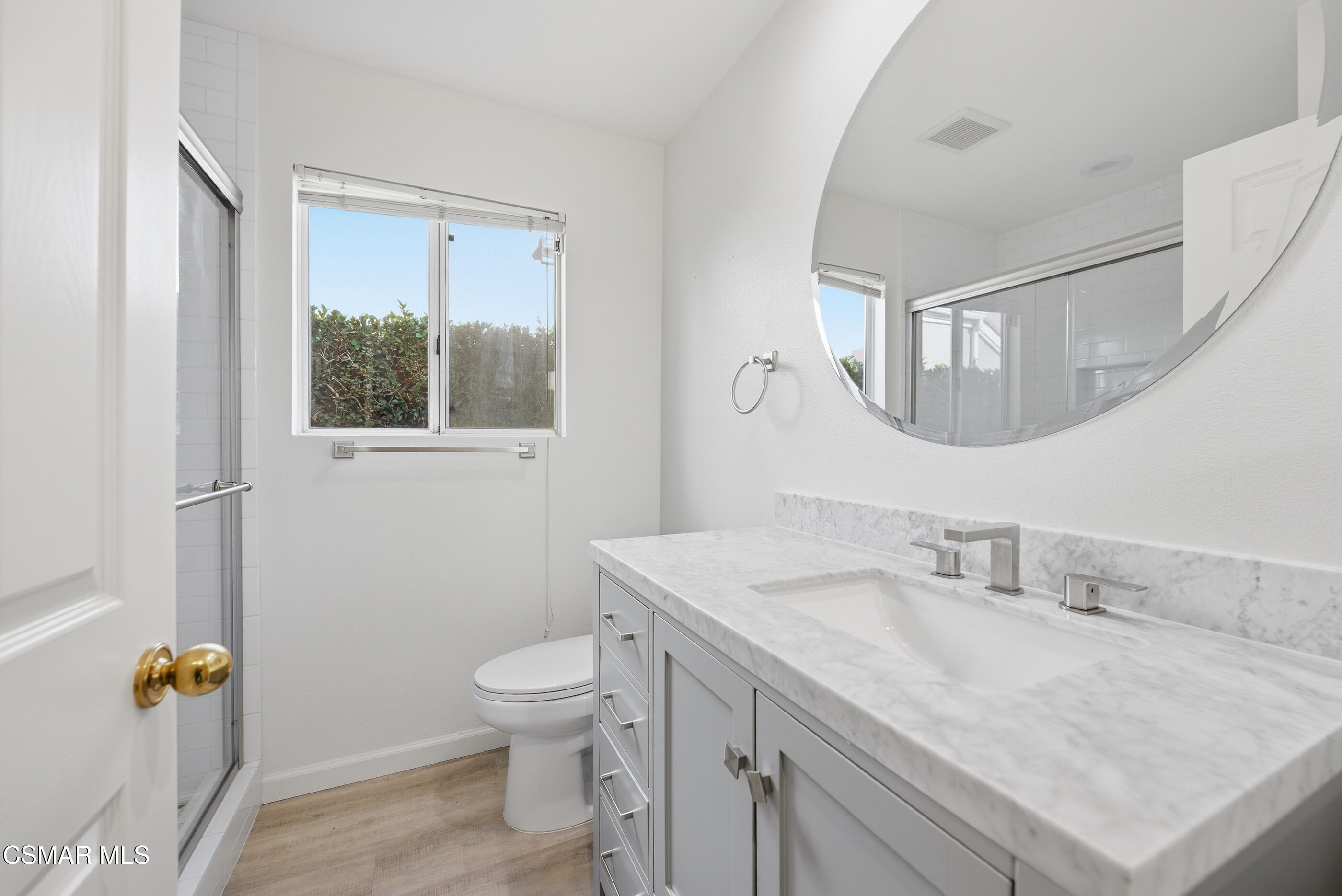 2565 Winthrop Court Simi Valley, CA 93065 - Photo 20 of 37 a bathroom with a sink toilet and mirror