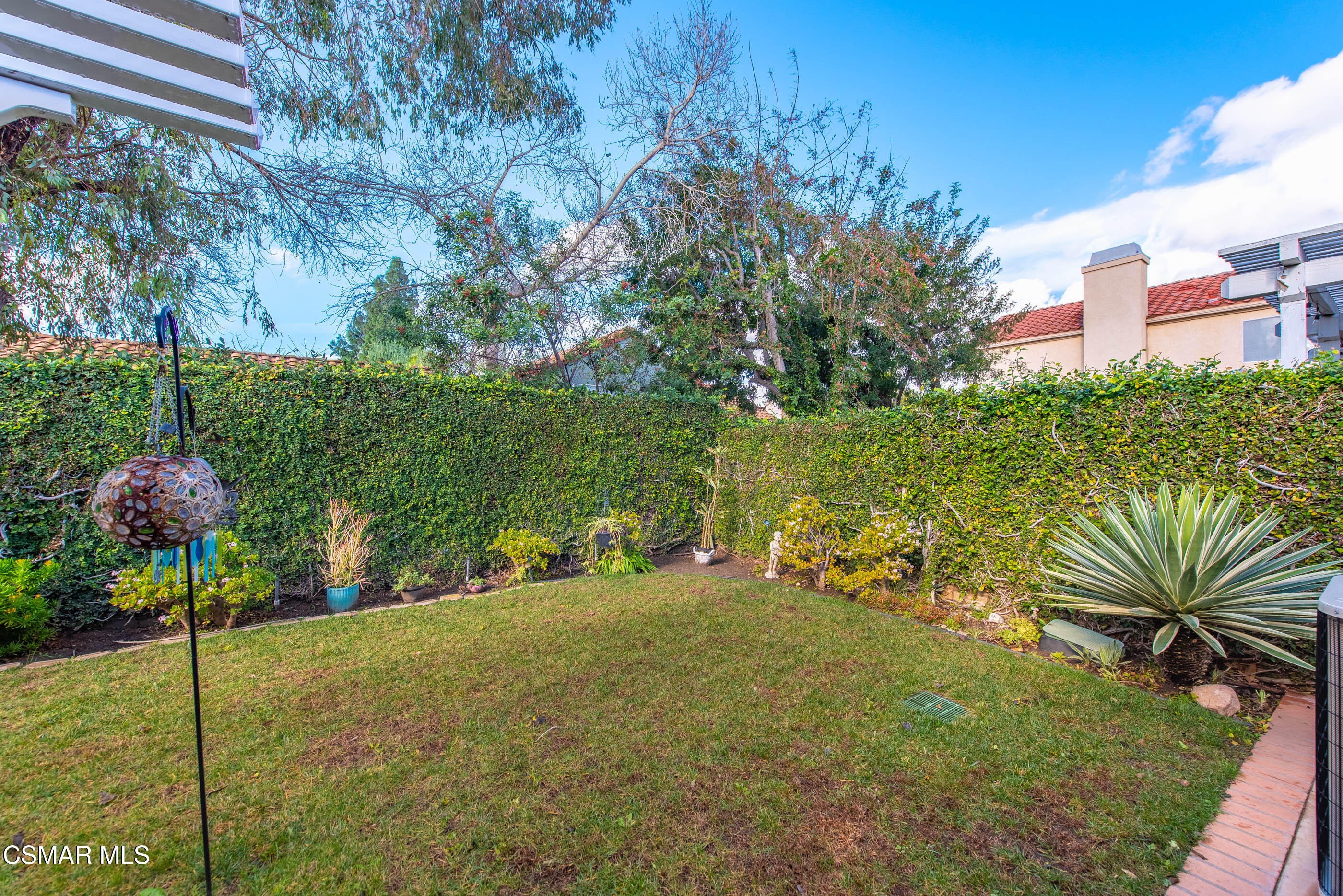 2565 Winthrop Court Simi Valley, CA 93065 - Photo 31 of 37 a table and chairs in the garden