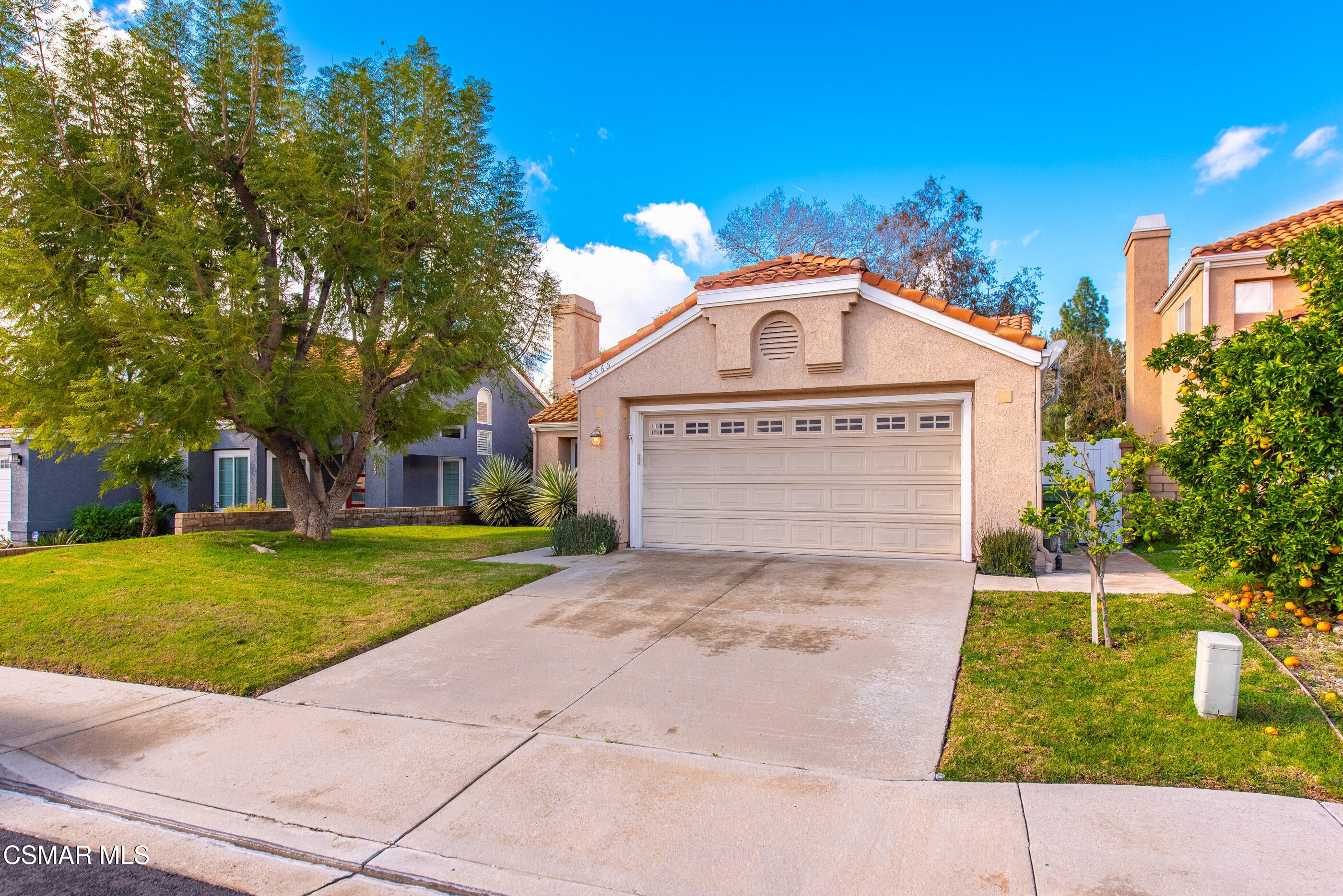 2565 Winthrop Court Simi Valley, CA 93065 - Photo 35 of 37 a front view of a house with a yard