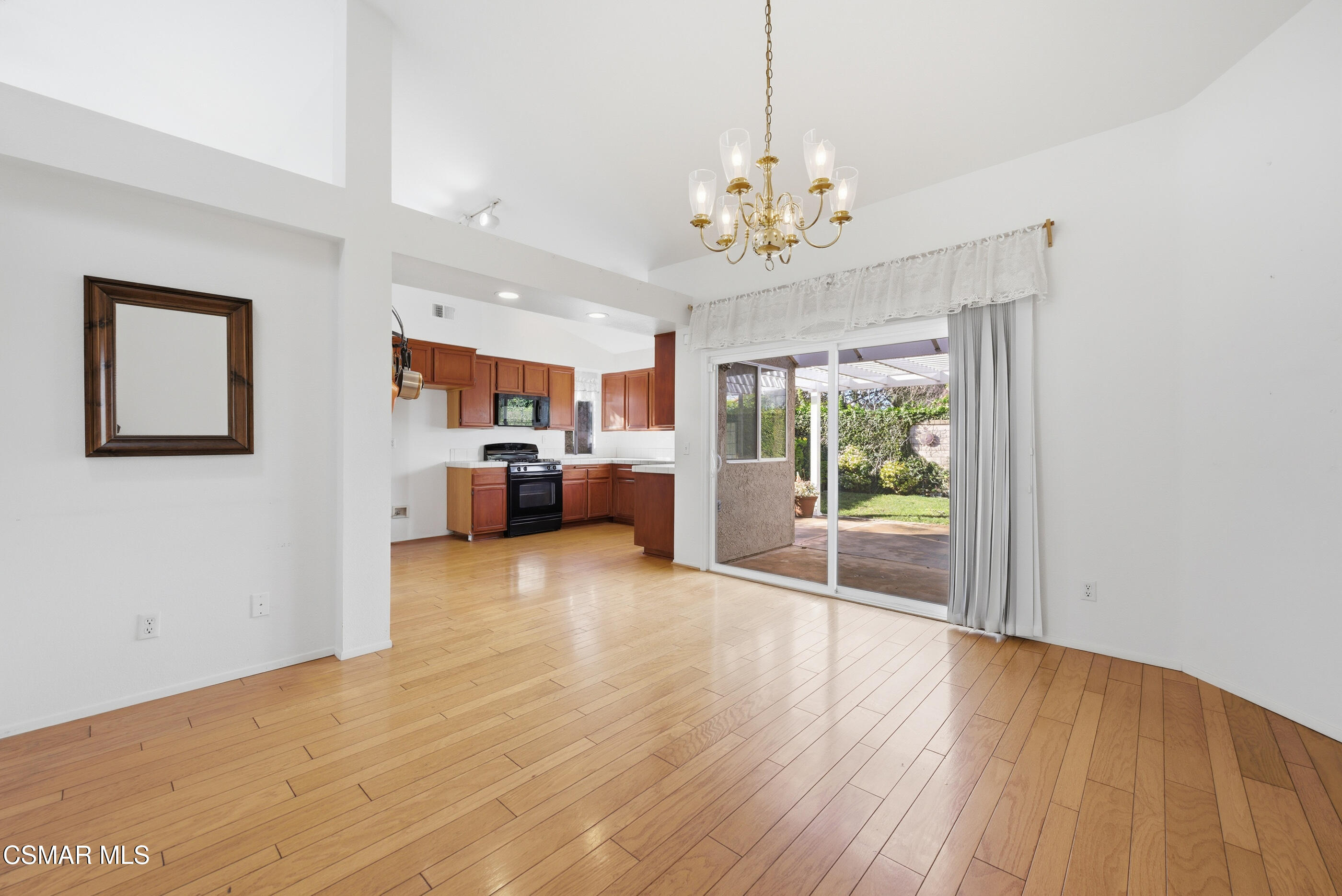 2565 Winthrop Court Simi Valley, CA 93065 - Photo 10 of 37 a view of a livingroom with a furniture wooden floor and chandelier
