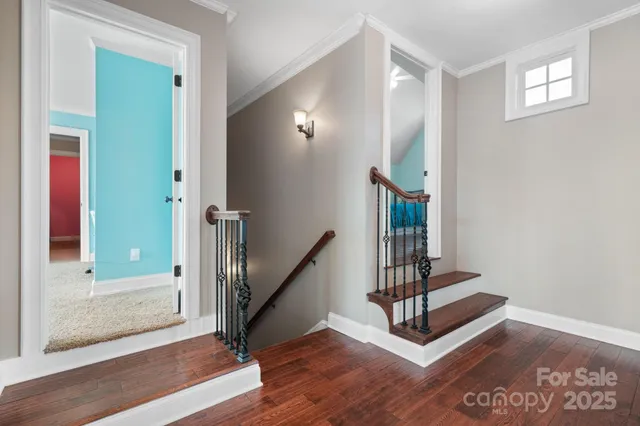 a view of entryway with wooden floor
