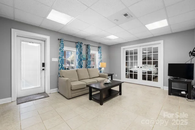 a living room with furniture and a table