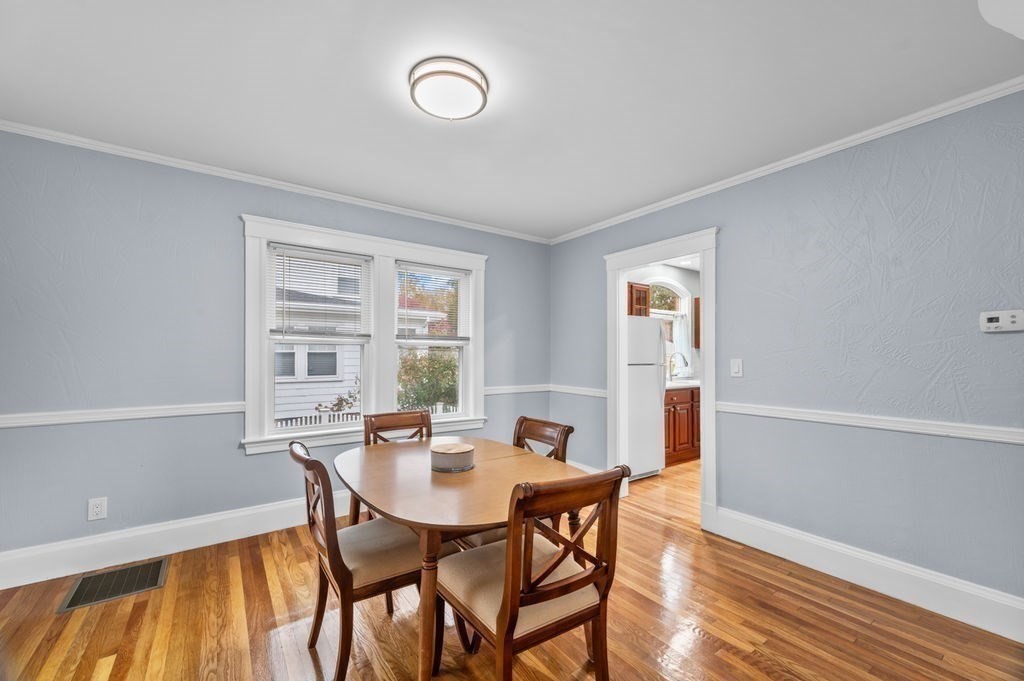25 Tedesco Street Marblehead, MA 01945 - Photo 12 of 42 a view of a dining room with furniture and window