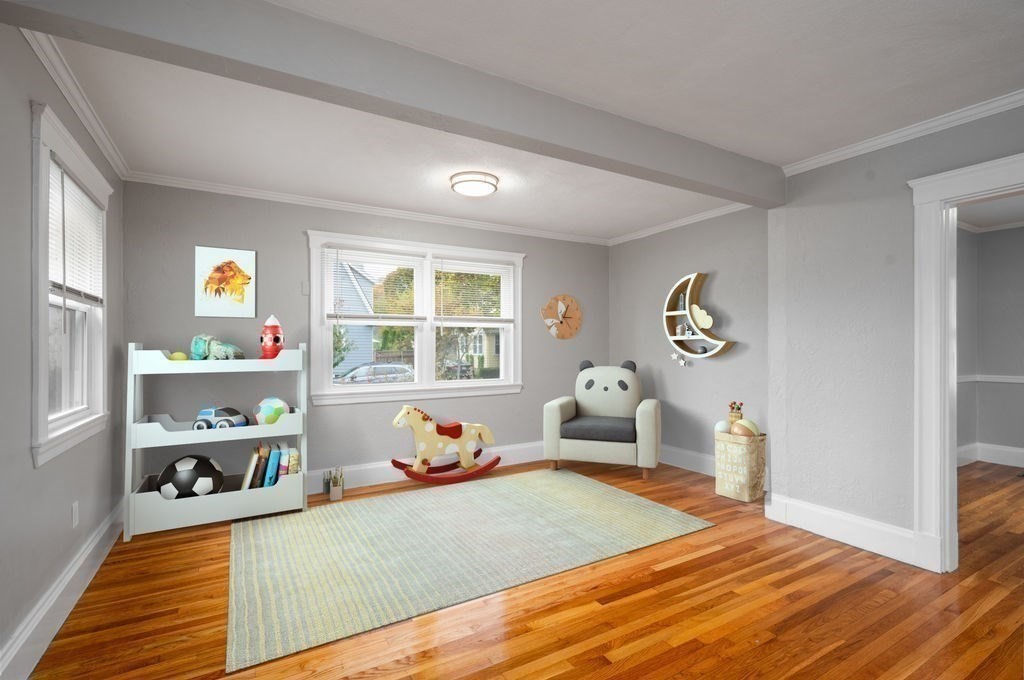 25 Tedesco Street Marblehead, MA 01945 - Photo 22 of 42 a bedroom with furniture and a window