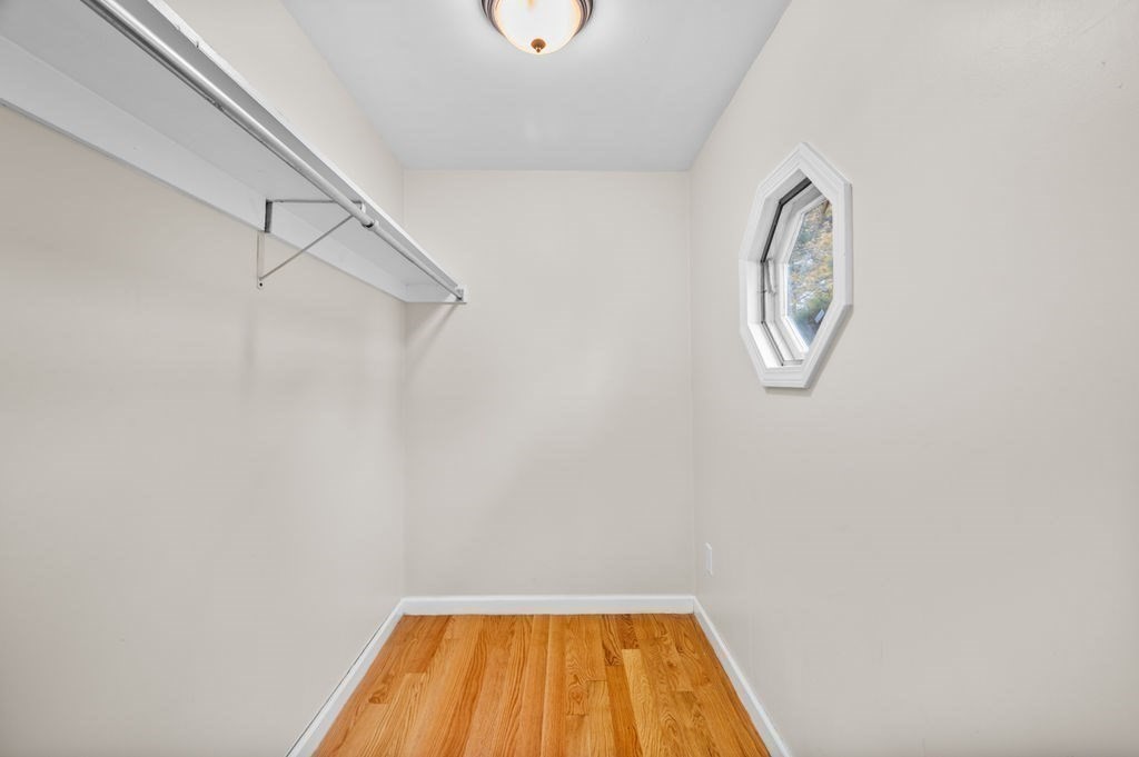 25 Tedesco Street Marblehead, MA 01945 - Photo 25 of 42 a view of a room with rack on the wall and a window