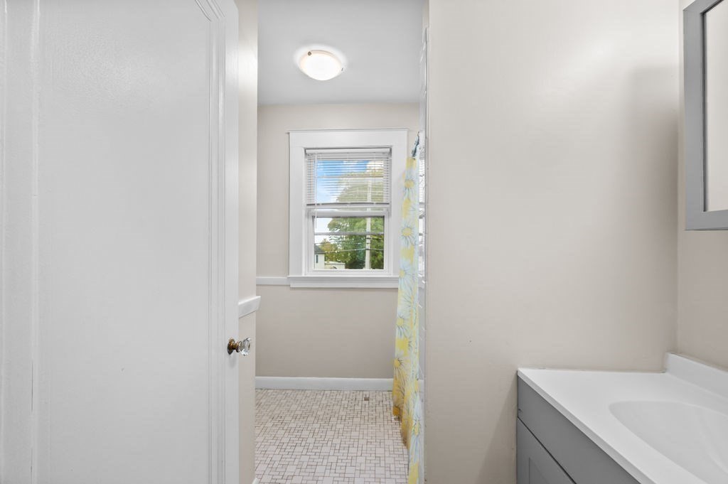25 Tedesco Street Marblehead, MA 01945 - Photo 26 of 42 a bathroom with a sink and window