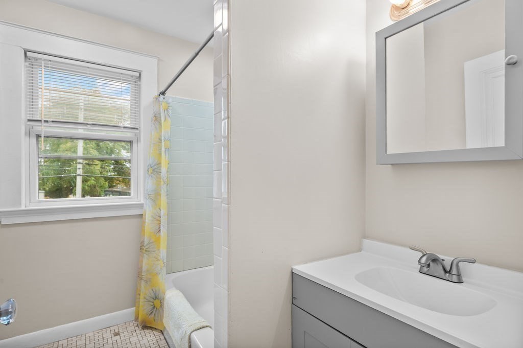 25 Tedesco Street Marblehead, MA 01945 - Photo 27 of 42 a bathroom with a sink and a vanity