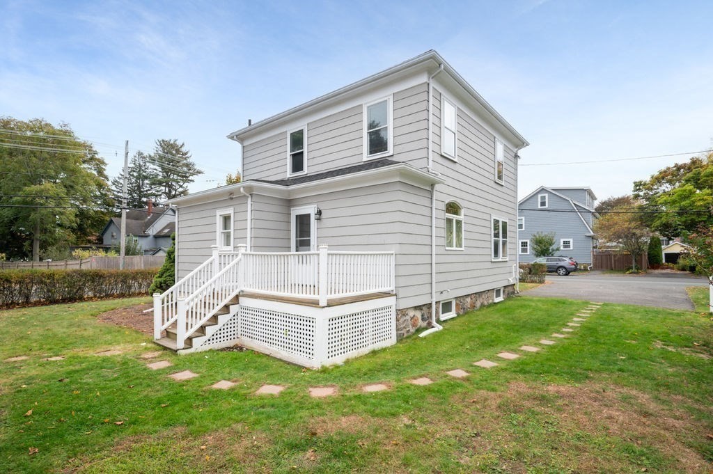 25 Tedesco Street Marblehead, MA 01945 - Photo 35 of 42 a view of a house with a yard and sitting area