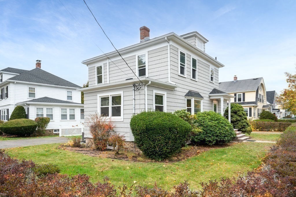 25 Tedesco Street Marblehead, MA 01945 - Photo 5 of 42 a front view of a house with a yard