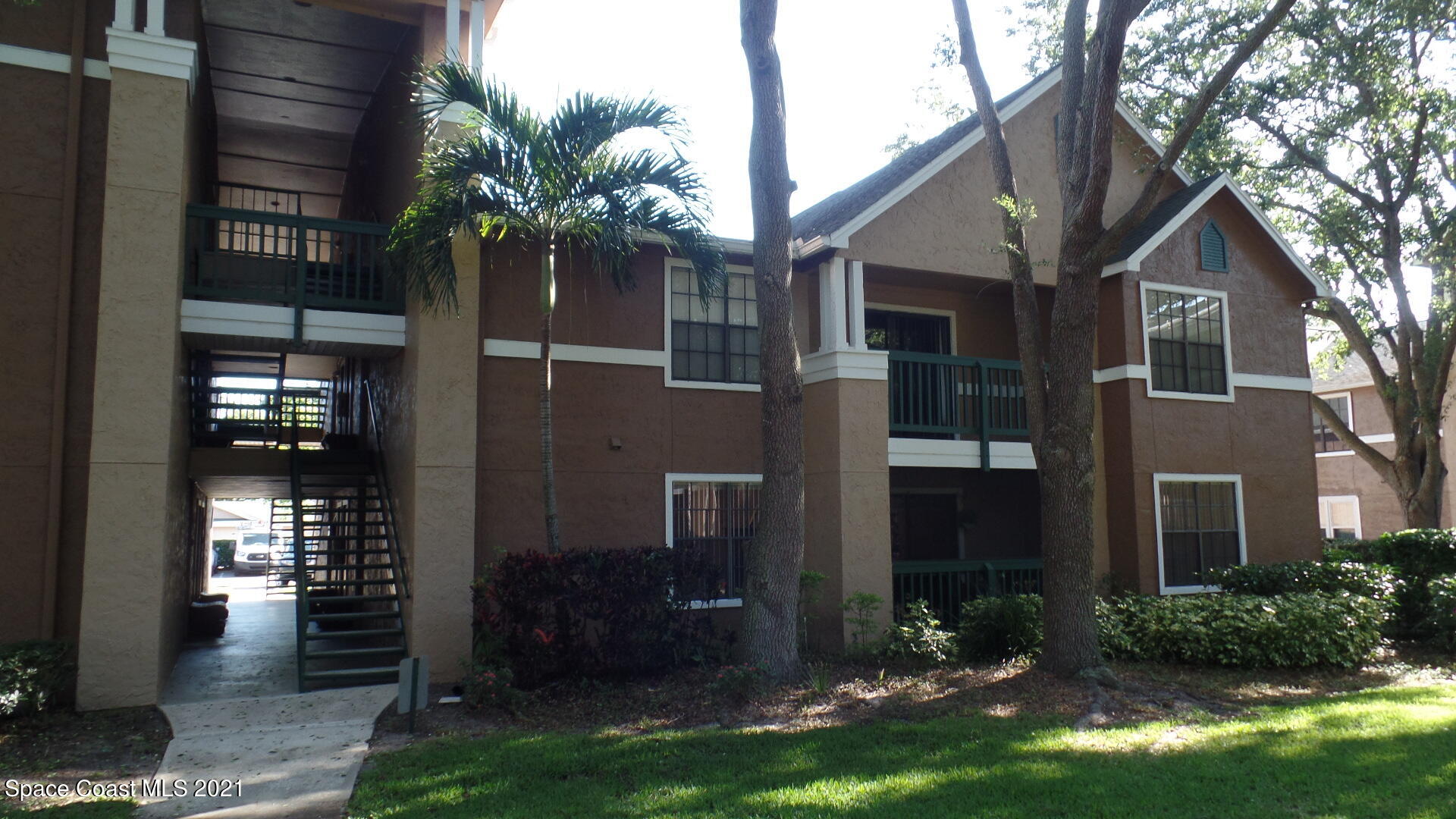7667 North Wickham Road, Unit 1402 Melbourne, FL 32940 - Photo 1 of 22 front