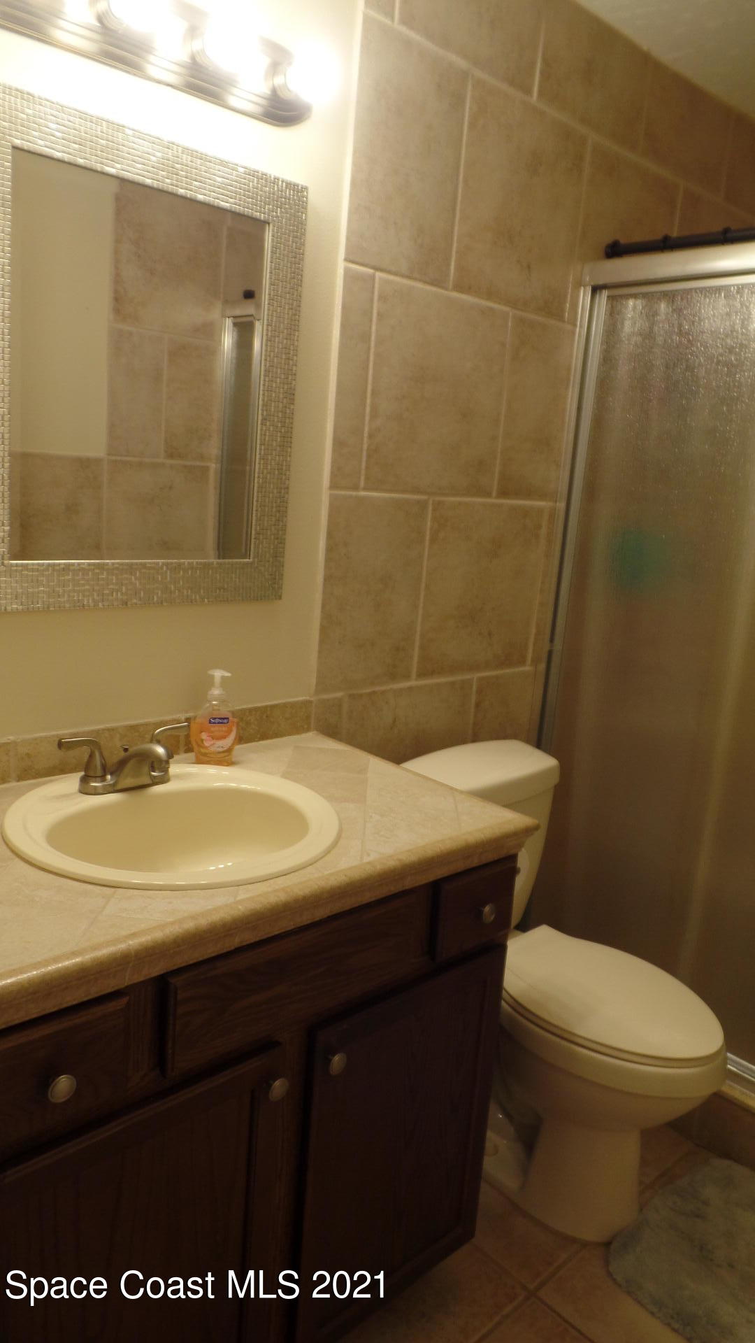 7667 North Wickham Road, Unit 1402 Melbourne, FL 32940 - Photo 14 of 22 Hall Bath