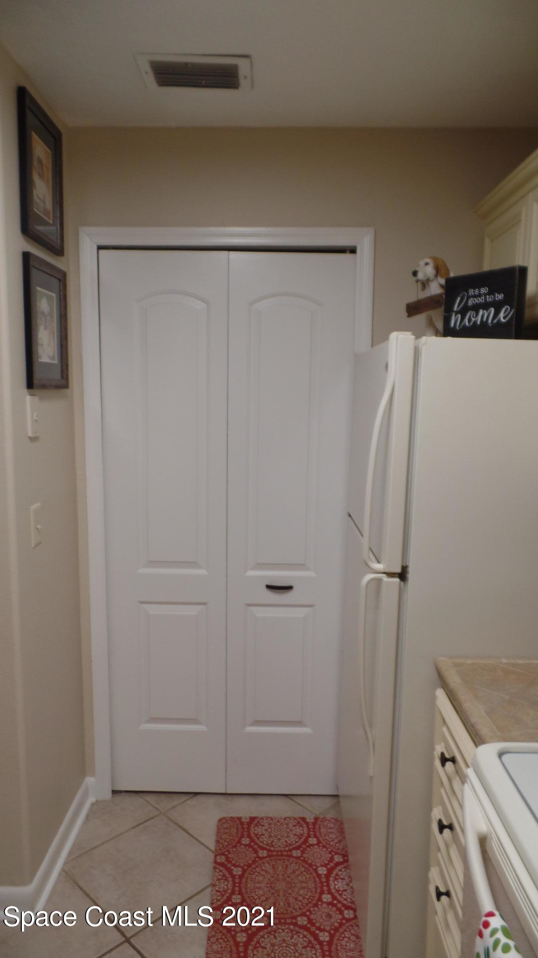 7667 North Wickham Road, Unit 1402 Melbourne, FL 32940 - Photo 16 of 22 Laundry Room