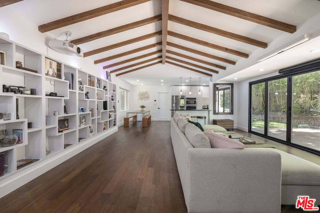 a view of a living room with furniture