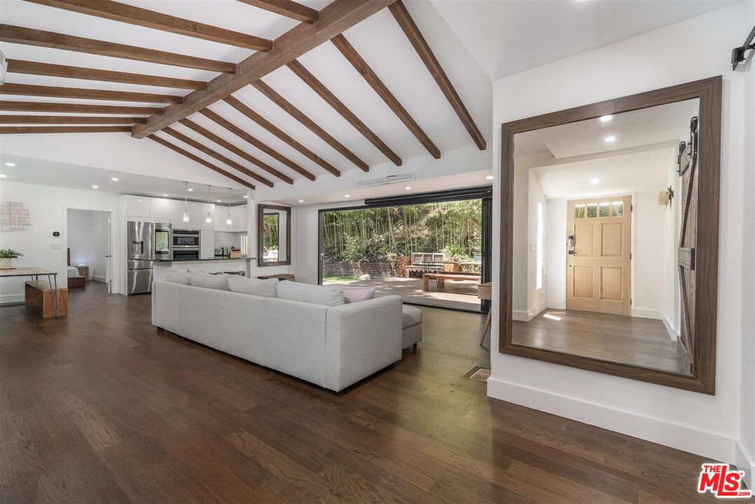 2429 Outpost Drive Los Angeles, CA 90068 - Photo 2 of 29 a living room with furniture and large windows