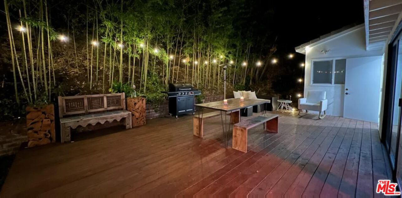 2429 Outpost Drive Los Angeles, CA 90068 - Photo 26 of 29 a living room with furniture and a wooden floor