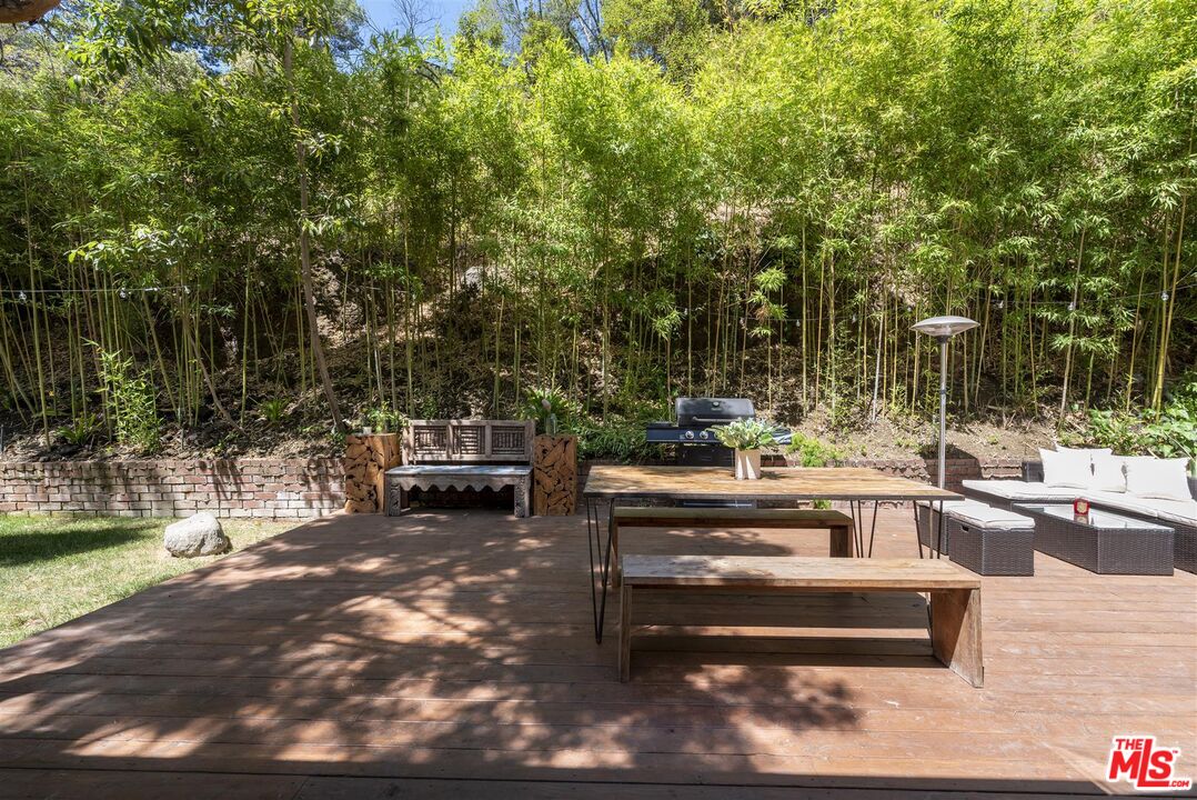 2429 Outpost Drive Los Angeles, CA 90068 - Photo 4 of 29 a outdoor space with lots of palm trees