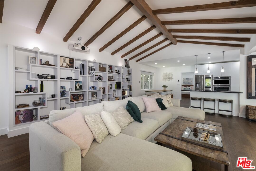 2429 Outpost Drive Los Angeles, CA 90068 - Photo 8 of 29 a living room with furniture and a rug