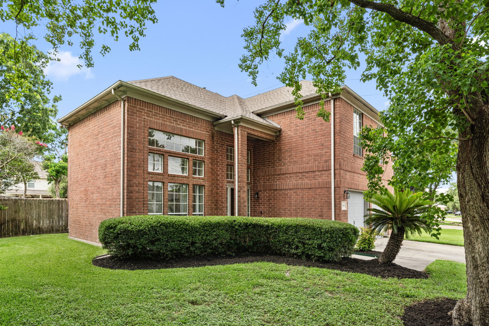 9715 Therrell Drive Houston, TX 77064 - Photo 32 of 33 a front view of a house with a yard