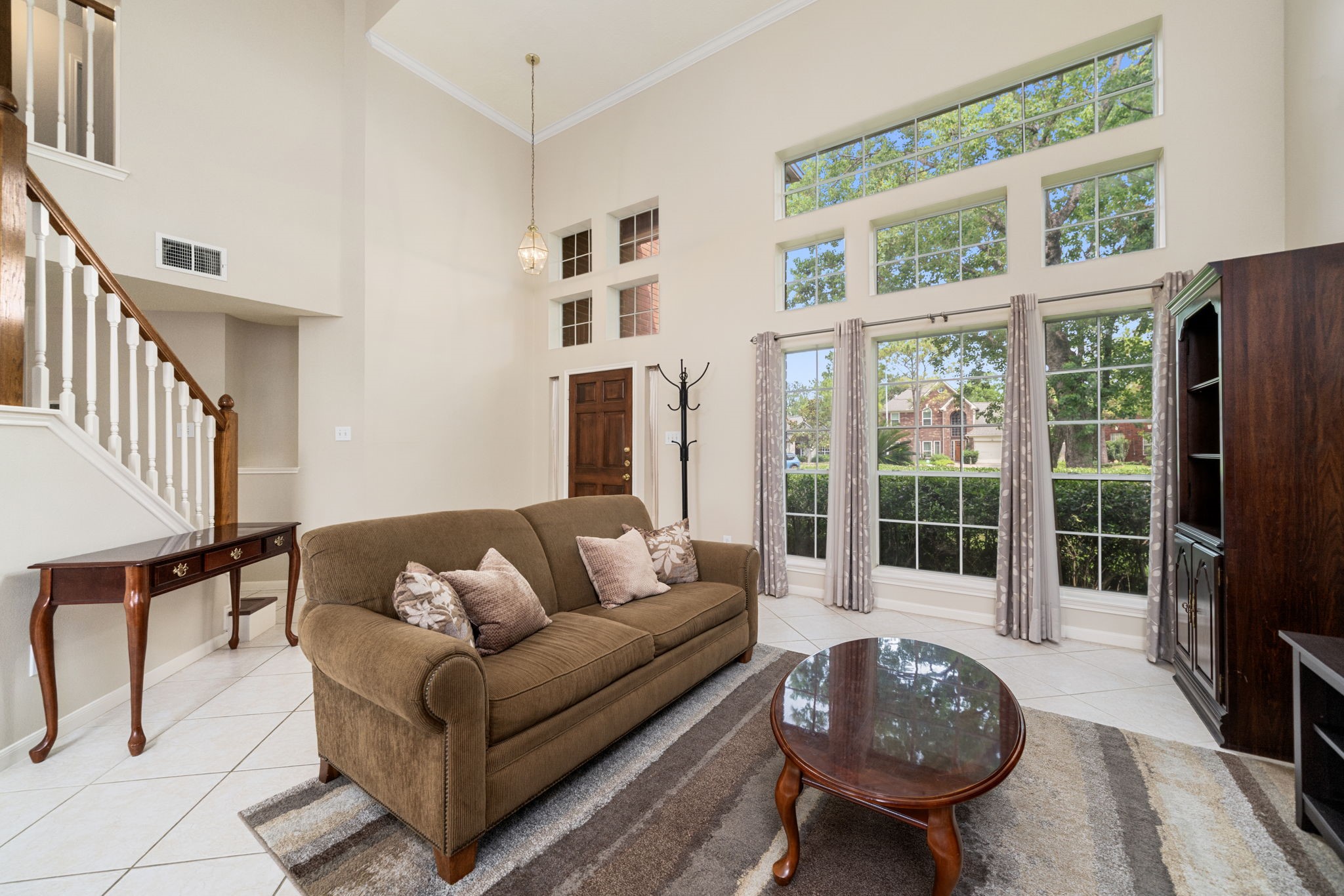 9715 Therrell Drive Houston, TX 77064 - Photo 7 of 33 a living room with furniture and a large window