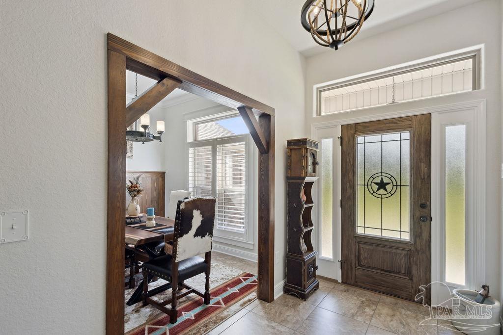 3480 Red Ryder Lane Pace, FL 32571 - Photo 16 of 47 a view of a livingroom with furniture and windows
