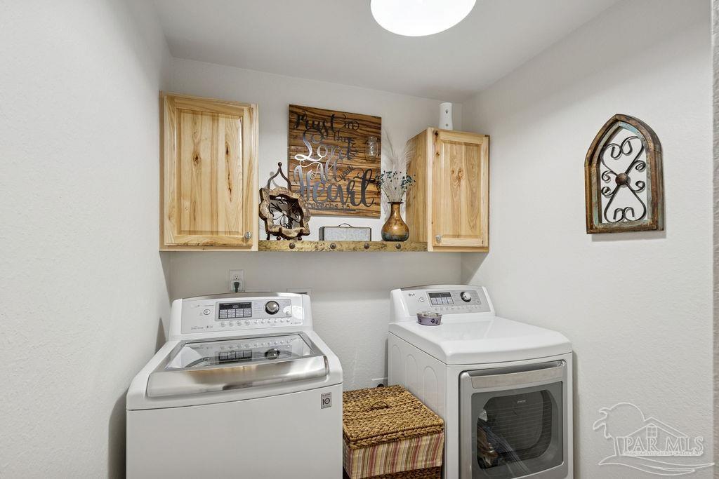 3480 Red Ryder Lane Pace, FL 32571 - Photo 28 of 47 a utility room with dryer and washer