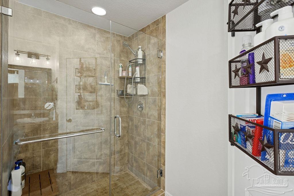 3480 Red Ryder Lane Pace, FL 32571 - Photo 31 of 47 a bathroom with a shower