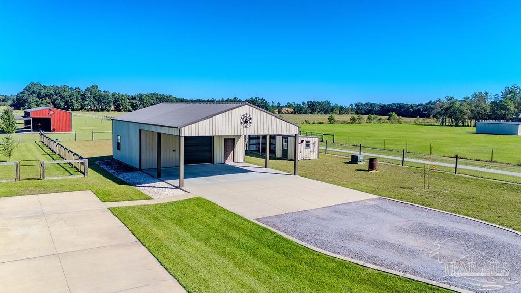 3480 Red Ryder Lane Pace, FL 32571 - Photo 40 of 47 a house with swimming pool in front of it