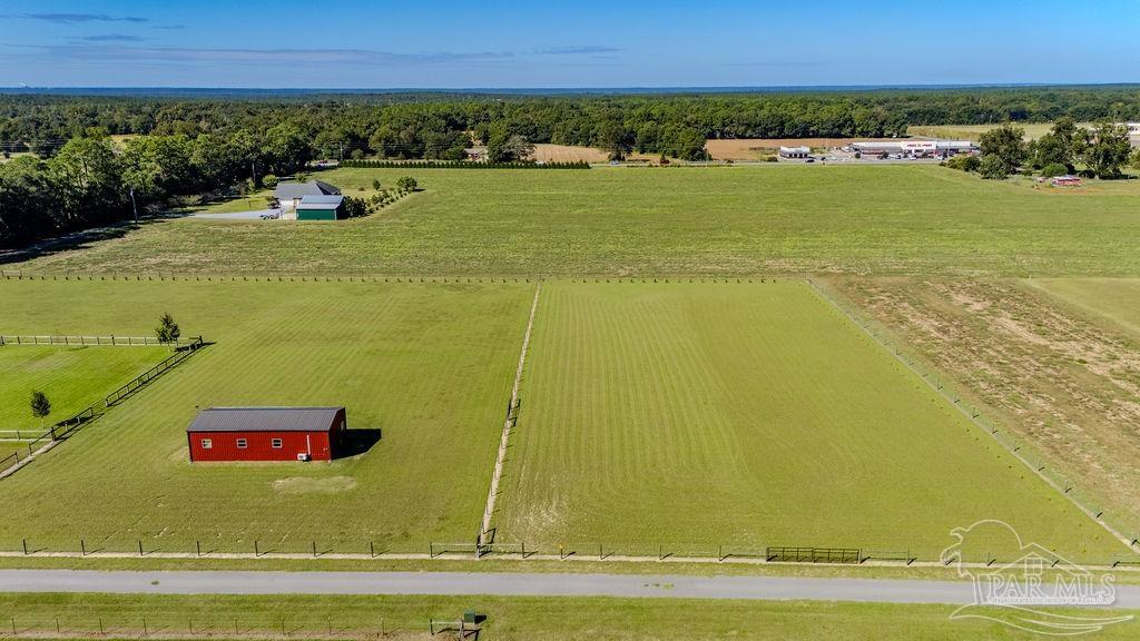 3480 Red Ryder Lane Pace, FL 32571 - Photo 41 of 47 a view of a swimming pool and an ocean view