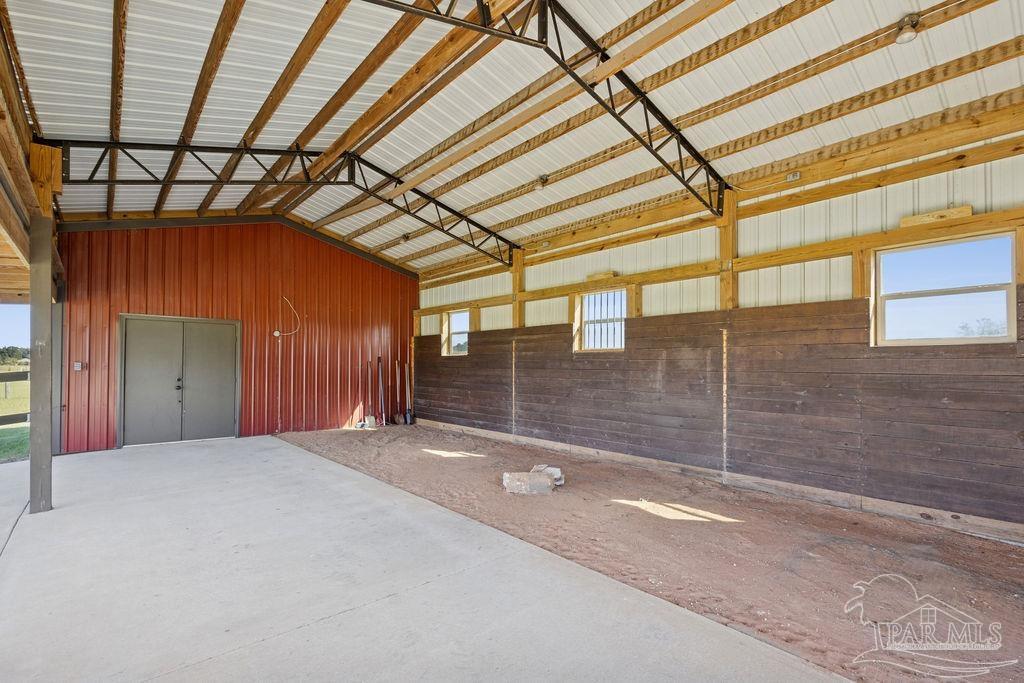 3480 Red Ryder Lane Pace, FL 32571 - Photo 46 of 47 a view of empty room with wooden floor
