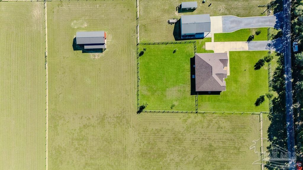 3480 Red Ryder Lane Pace, FL 32571 - Photo 5 of 47 a bathroom with a sink and mirror