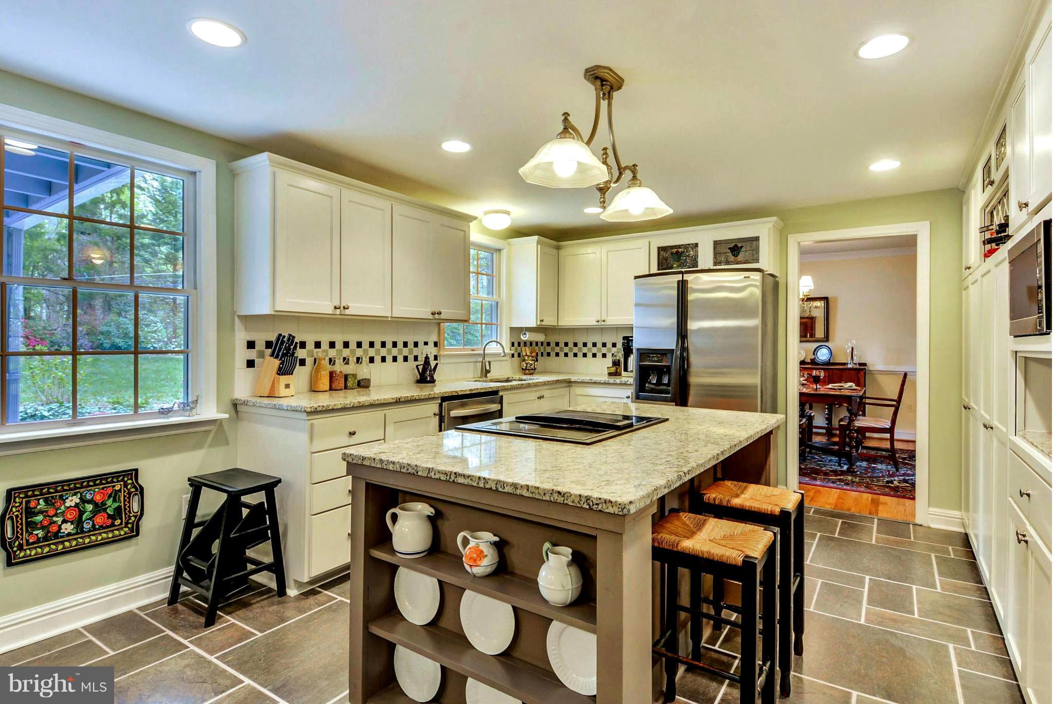 76 Chautaugua Road Arnold, MD 21012 - Photo 14 of 30 Custom Built-Ins and Cooktop Island / Dining Bar