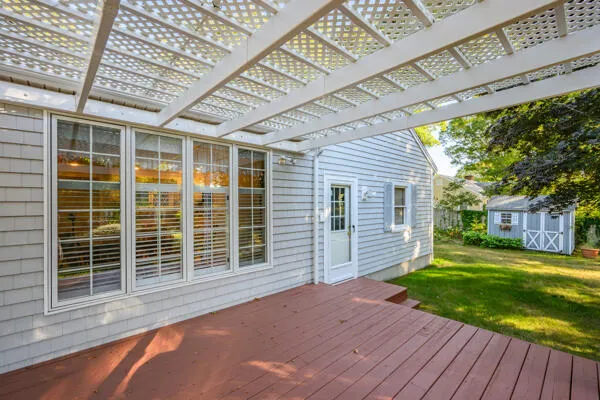 a view of a patio with wooden floor