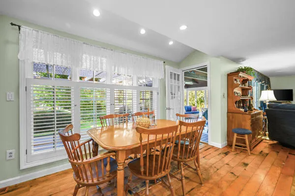 a living room with furniture fireplace and a flat screen tv