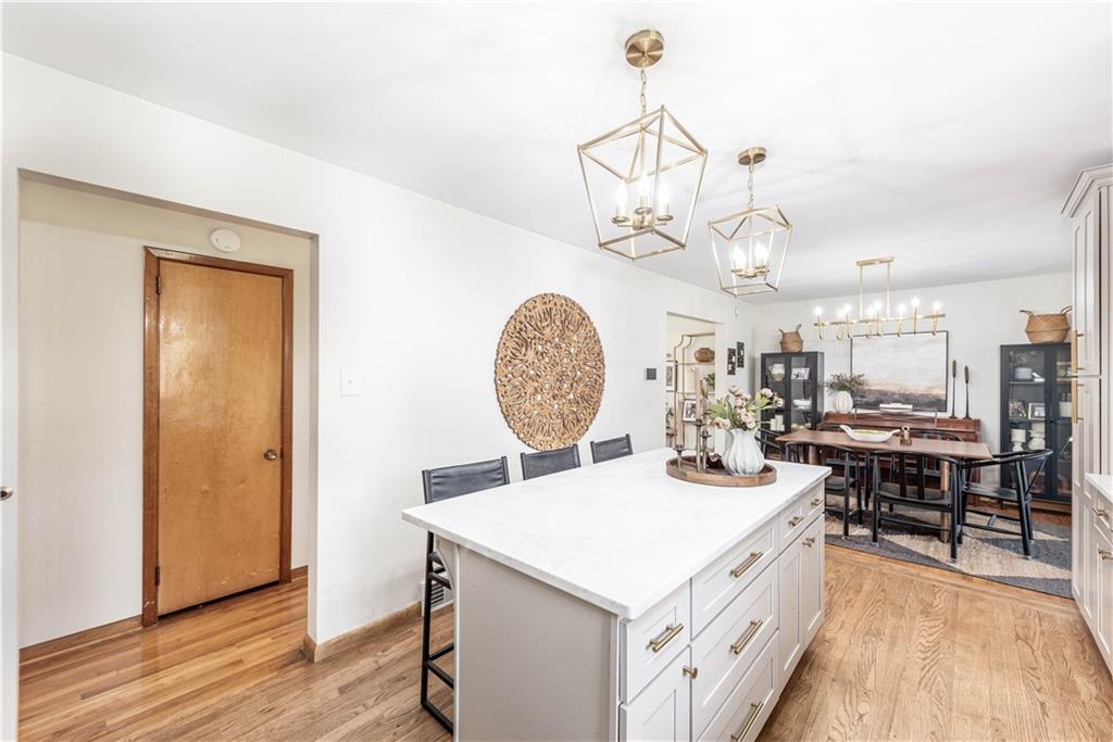 15 Watson Street Sewickley, PA 15143 - Photo 12 of 43 a view of a table and chairs in a room