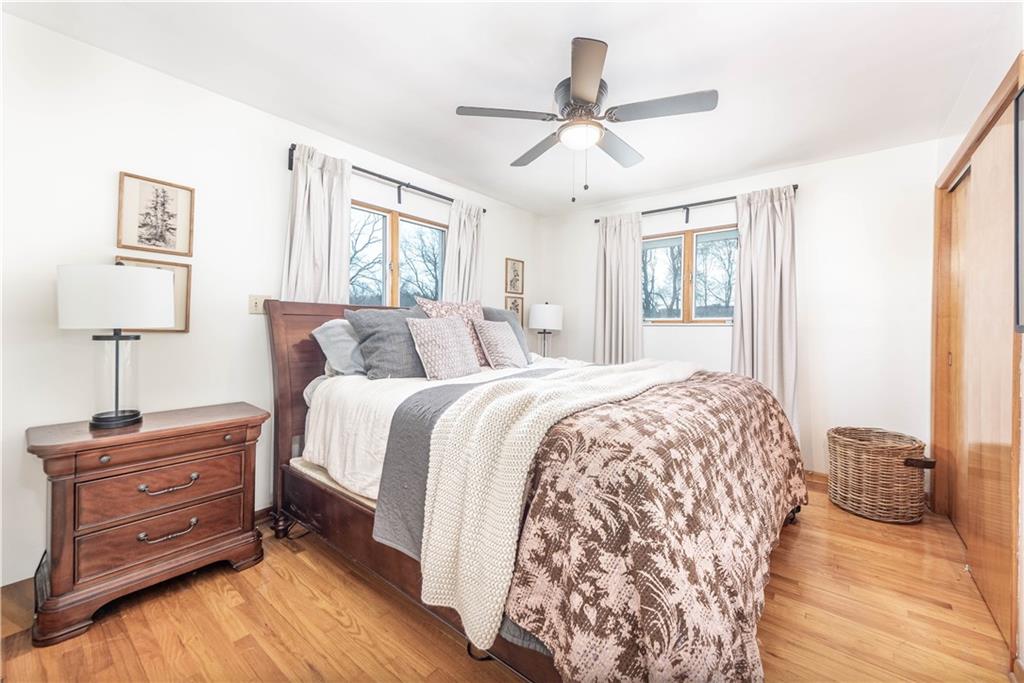 15 Watson Street Sewickley, PA 15143 - Photo 15 of 43 a bedroom with a bed and wooden floor