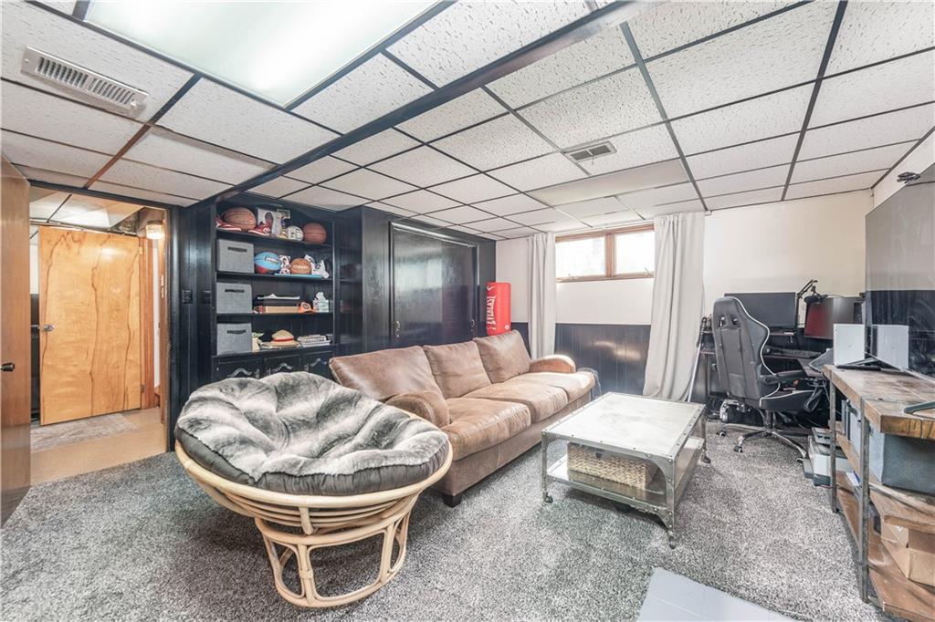 15 Watson Street Sewickley, PA 15143 - Photo 26 of 43 a living room with furniture and a wooden floor