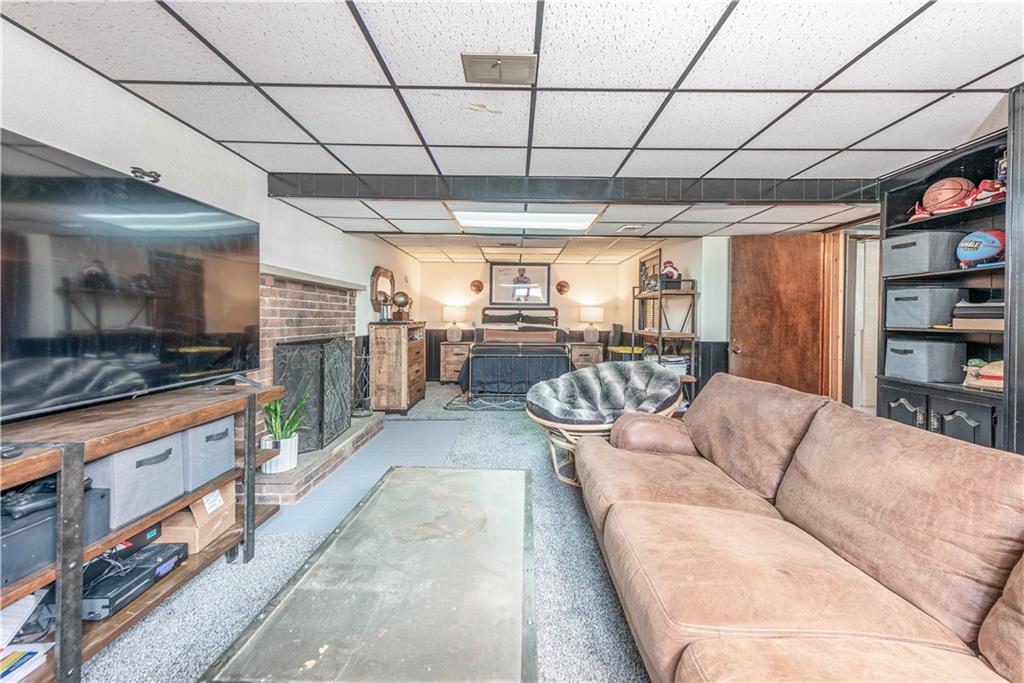 15 Watson Street Sewickley, PA 15143 - Photo 27 of 43 a living room with furniture and a flat screen tv