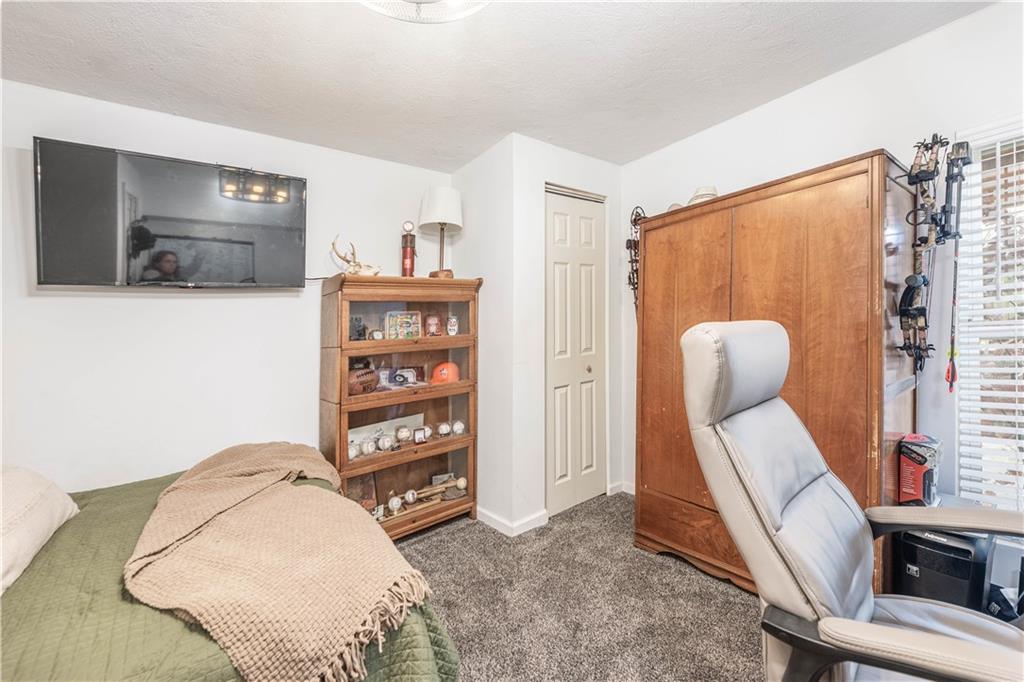 15 Watson Street Sewickley, PA 15143 - Photo 31 of 43 a living room with furniture and a flat screen tv