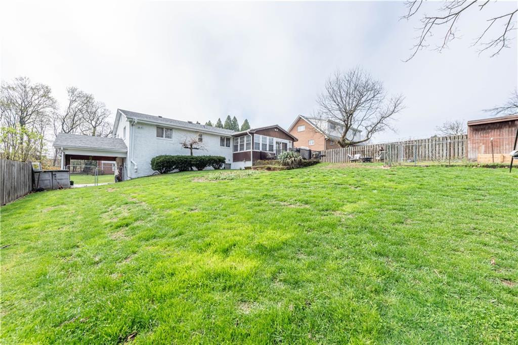 15 Watson Street Sewickley, PA 15143 - Photo 36 of 43 a view of a house with a big yard and large trees