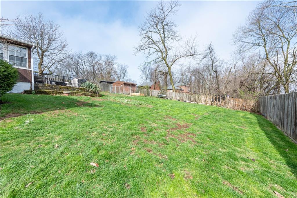 15 Watson Street Sewickley, PA 15143 - Photo 38 of 43 a backyard of a house with lots of green space