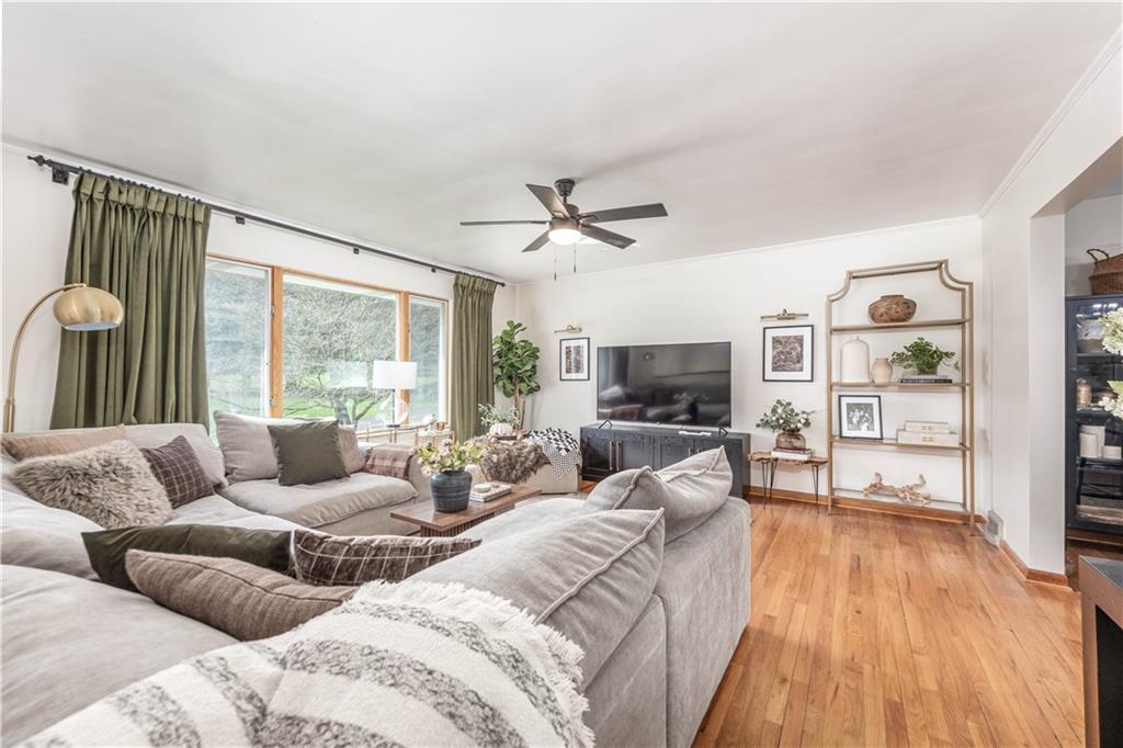 15 Watson Street Sewickley, PA 15143 - Photo 4 of 43 a living room with furniture and a flat screen tv