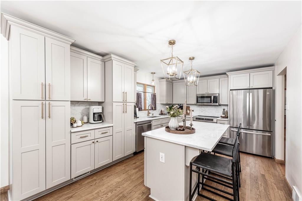 15 Watson Street Sewickley, PA 15143 - Photo 9 of 43 a kitchen with a sink stainless steel appliances and cabinets