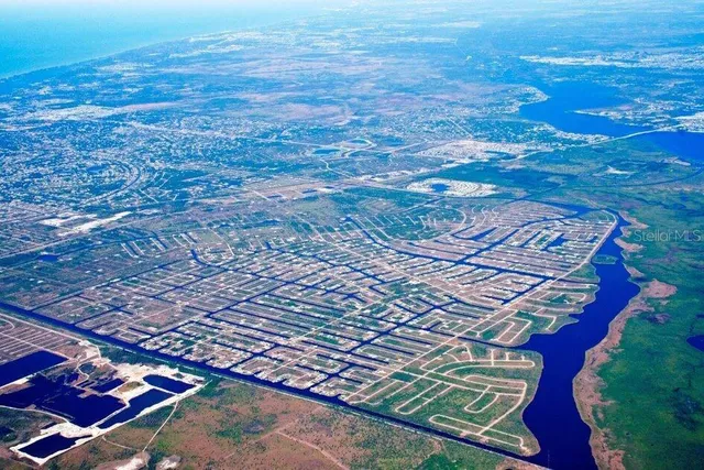 a view of a lake with a big yard