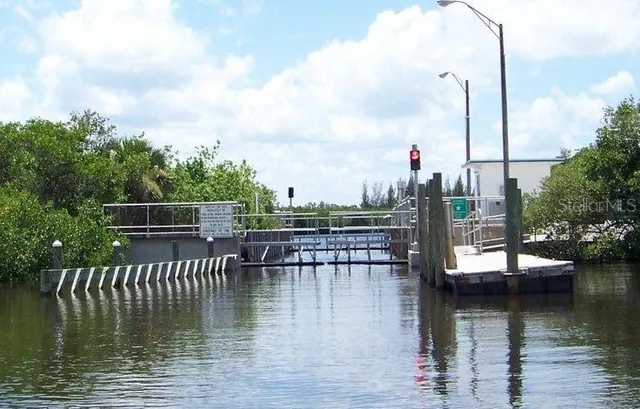 a view of a lake with a big yard