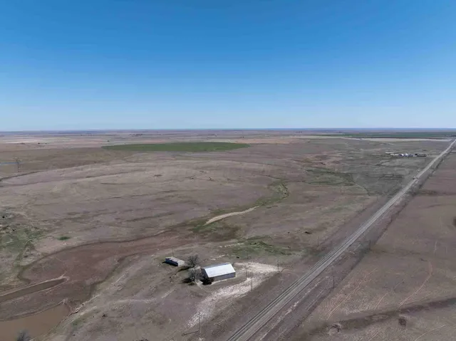 an aerial view of beach and ocean
