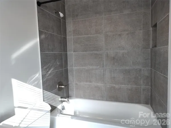 a bathroom with a bathtub
